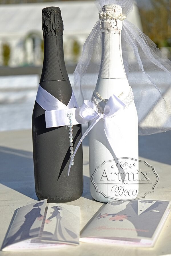 Оформление бутылок шампанского на свадьбе